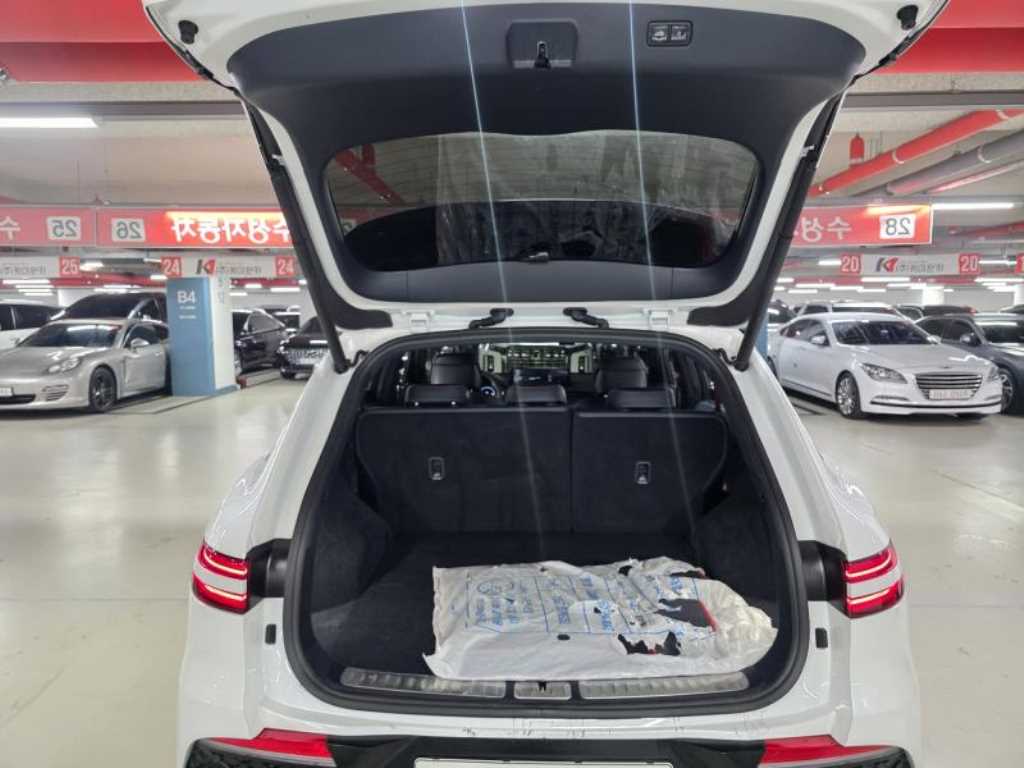 Genesis GV70 - Vista 7