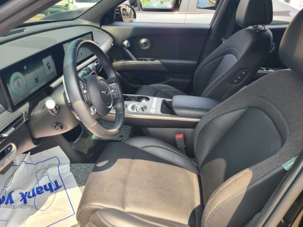 Genesis GV60 - Vista 7