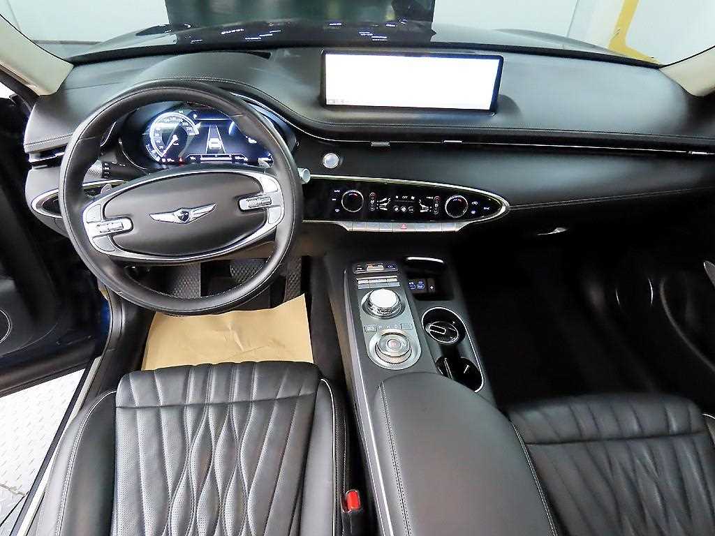 Genesis GV70 - Vista 7