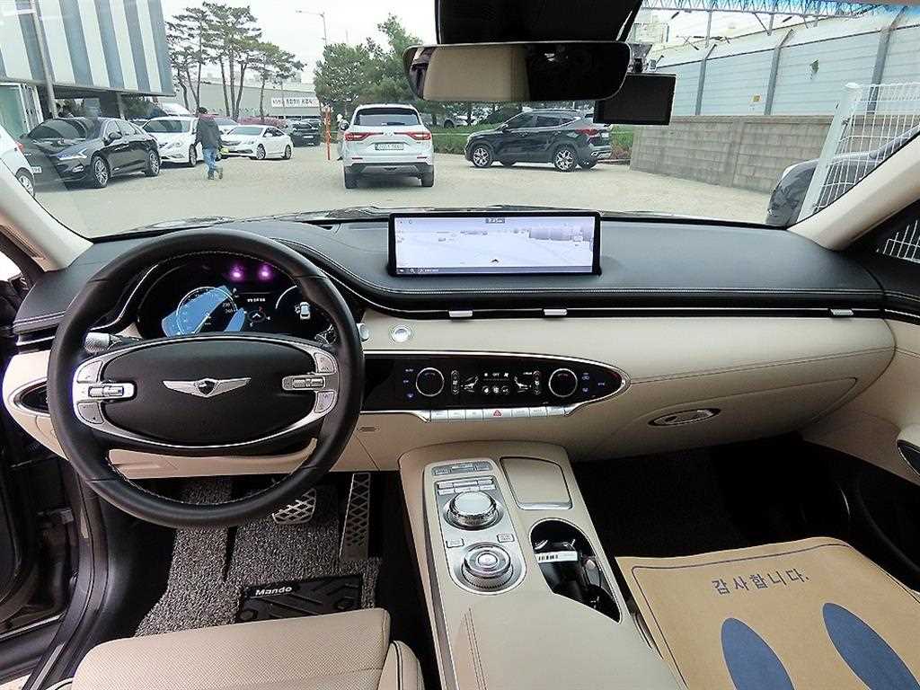 Genesis GV70 - Vista 7
