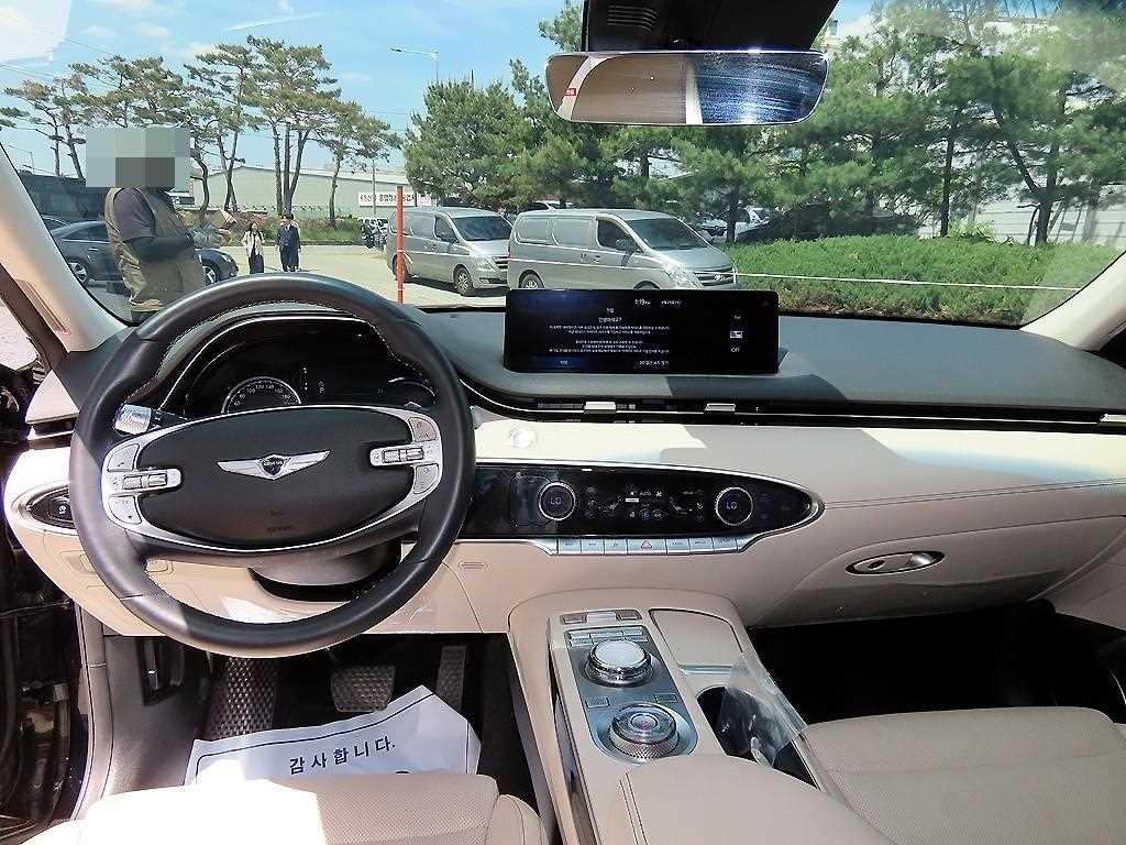 Genesis GV70 - Vista 7