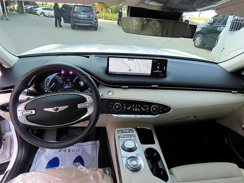 Genesis GV70 - Vista 7