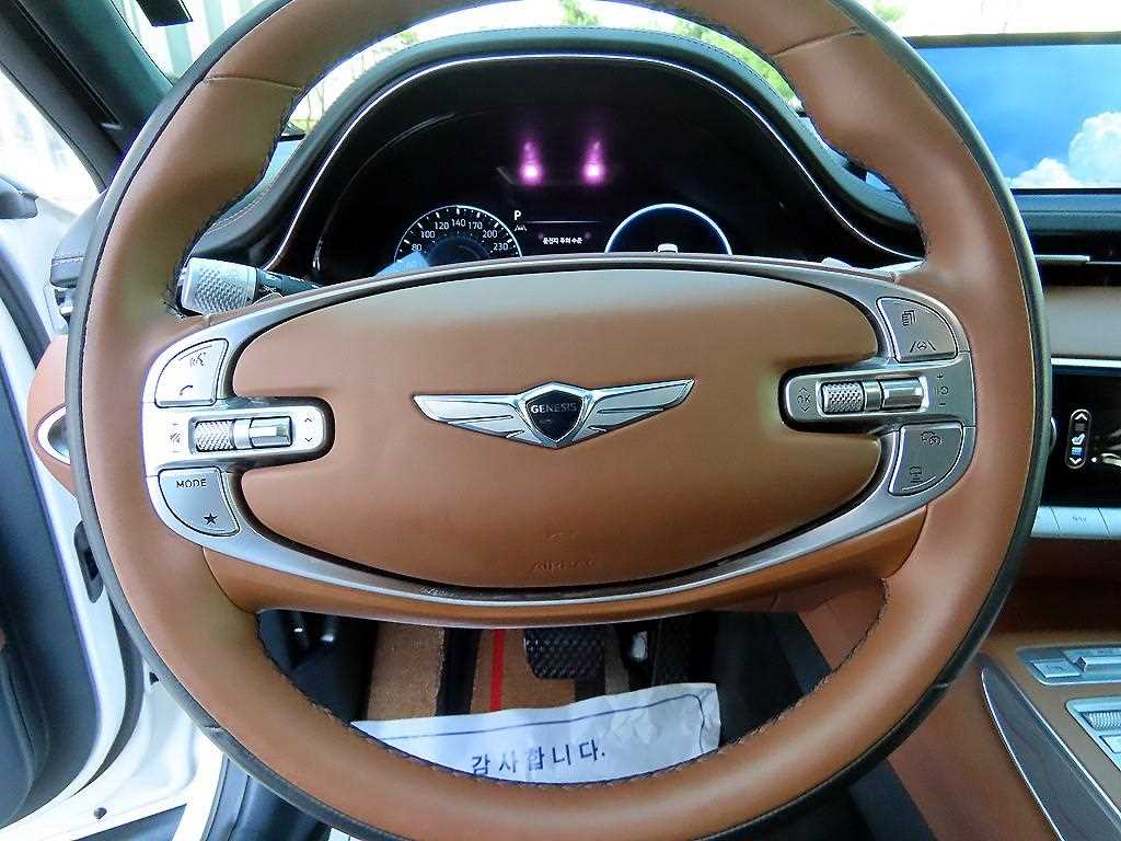 Genesis GV70 - Vista 8