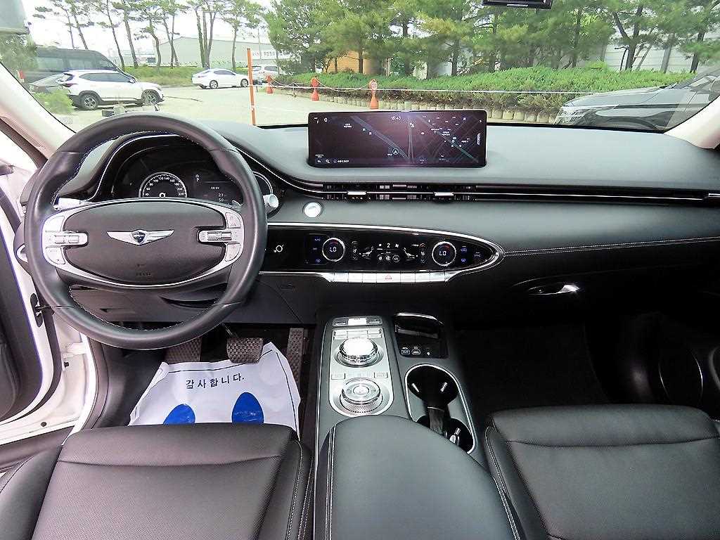Genesis GV70 - Vista 7
