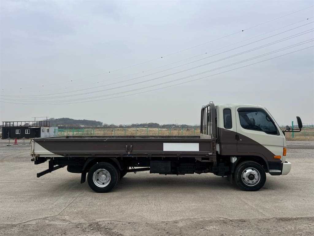 medium and large cargo Cargo 2009 Blanco - Importación desde Corea - HF Imports Iquique - Foto 1