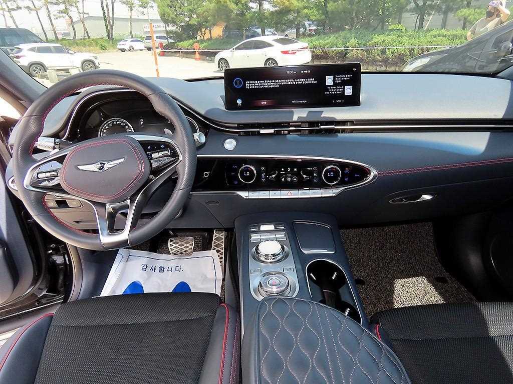 Genesis GV70 - Vista 7
