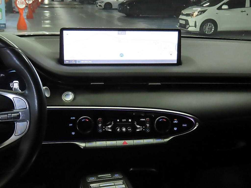 Genesis GV70 - Vista 11