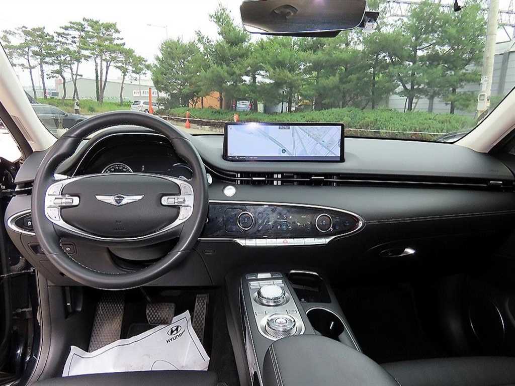 Genesis GV70 - Vista 7