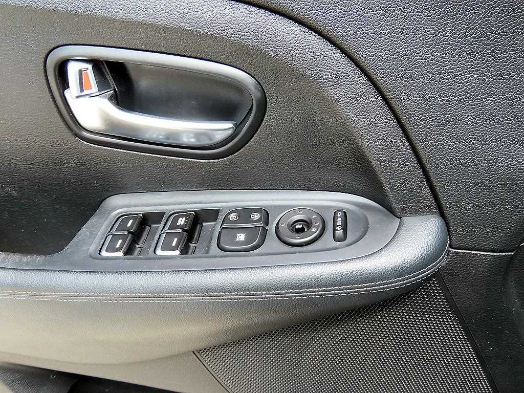 KIA Carens - Vista 11