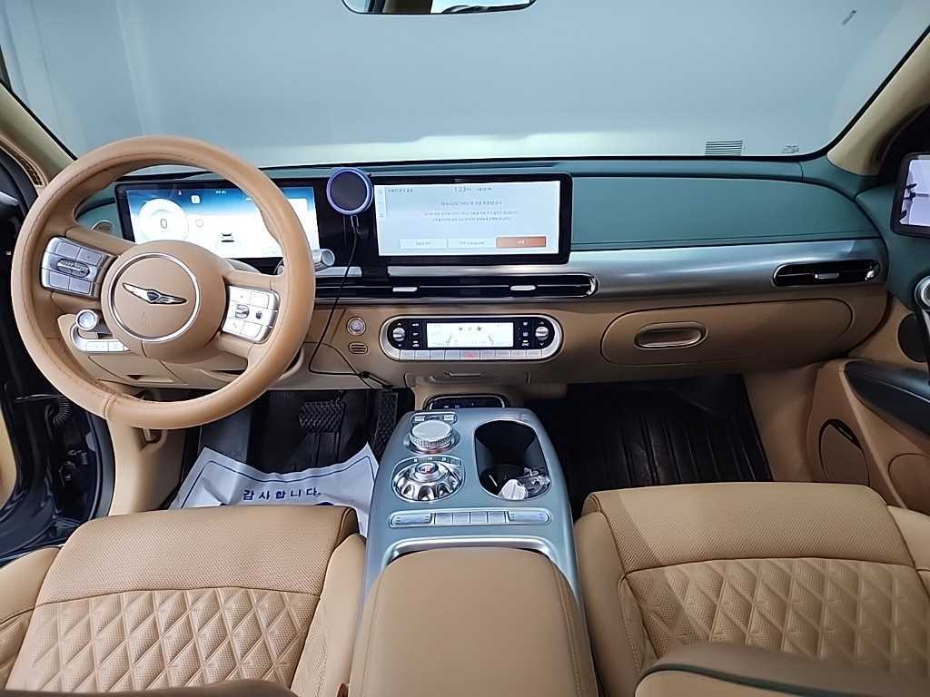 Genesis GV60 - Vista 7