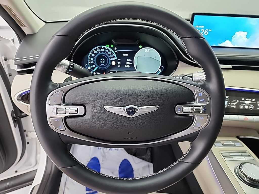 Genesis GV70 - Vista 9