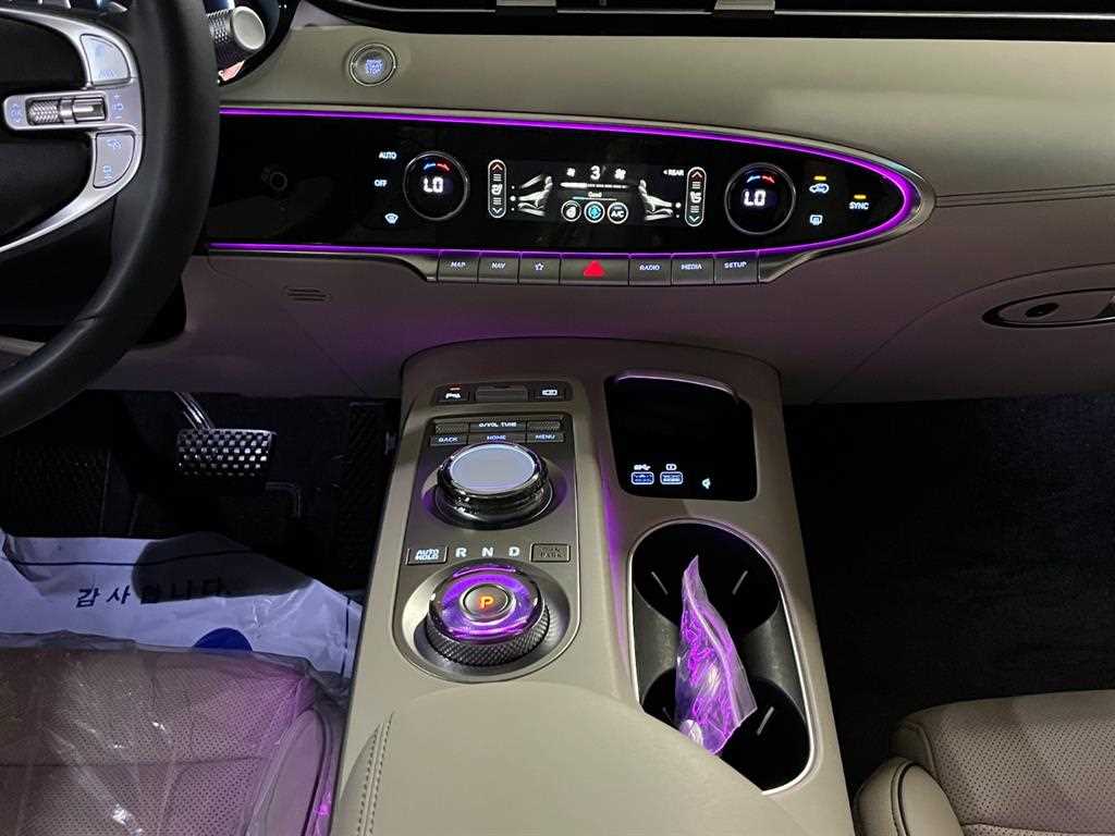Genesis GV70 - Vista 7