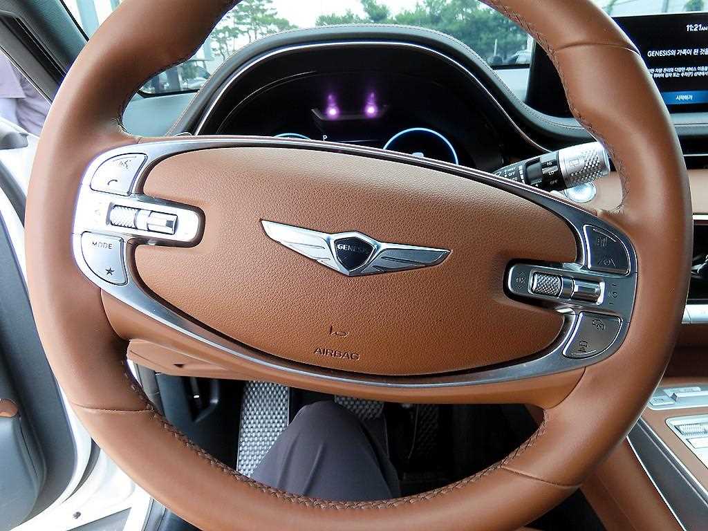 Genesis GV70 - Vista 8