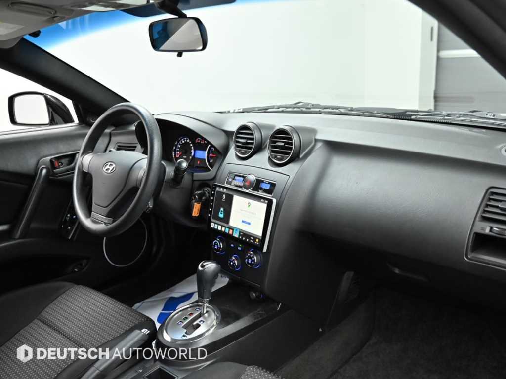 HYUNDAI Tuscani - Vista 7