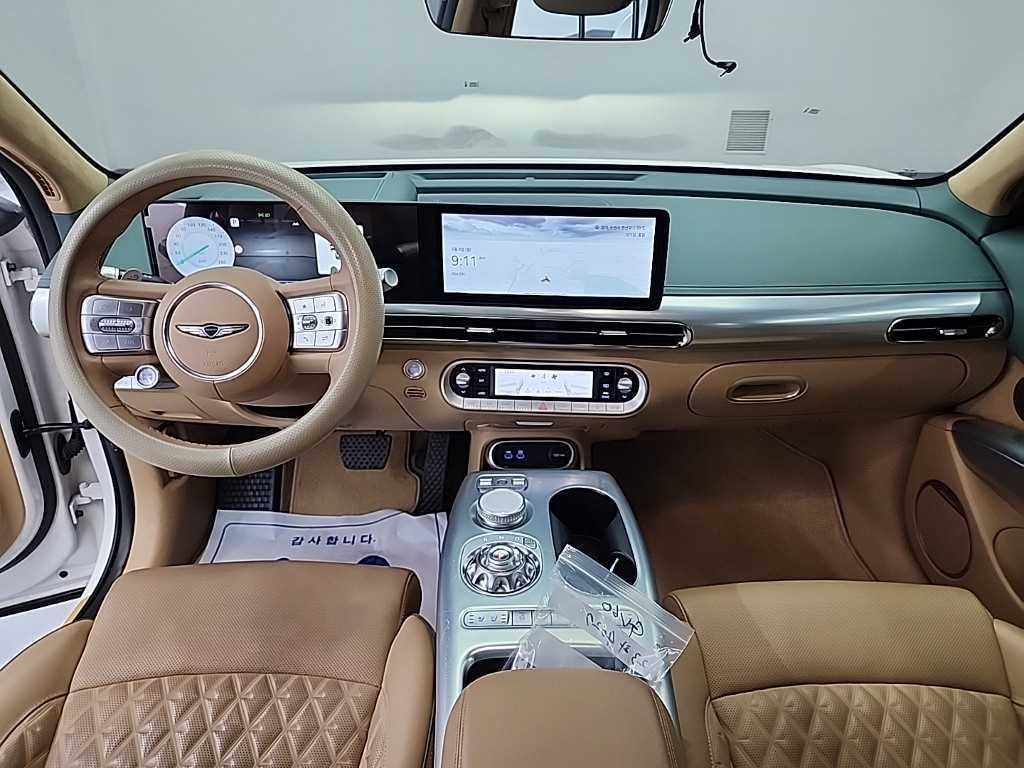 Genesis GV60 - Vista 7