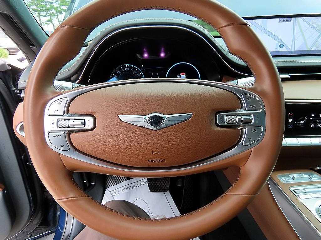 Genesis GV70 - Vista 8