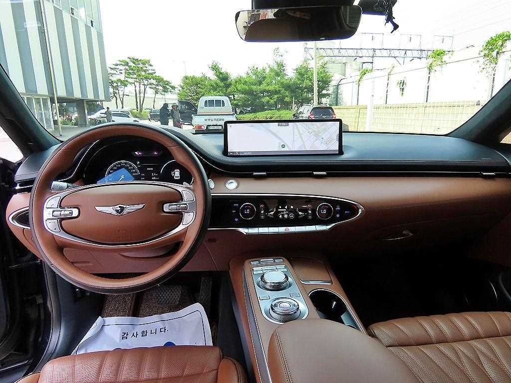 Genesis GV70 - Vista 7