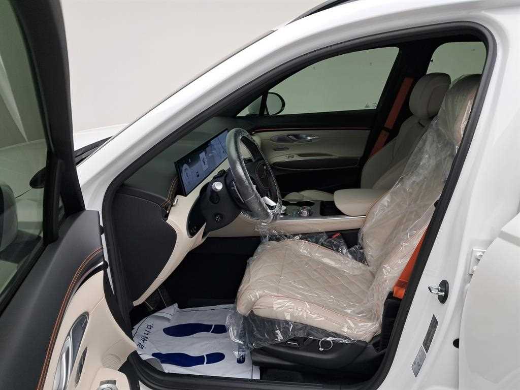 Genesis GV70 - Vista 7