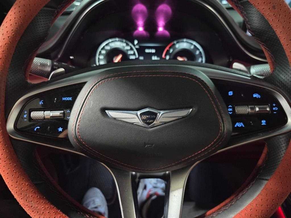 Genesis GV70 - Vista 7
