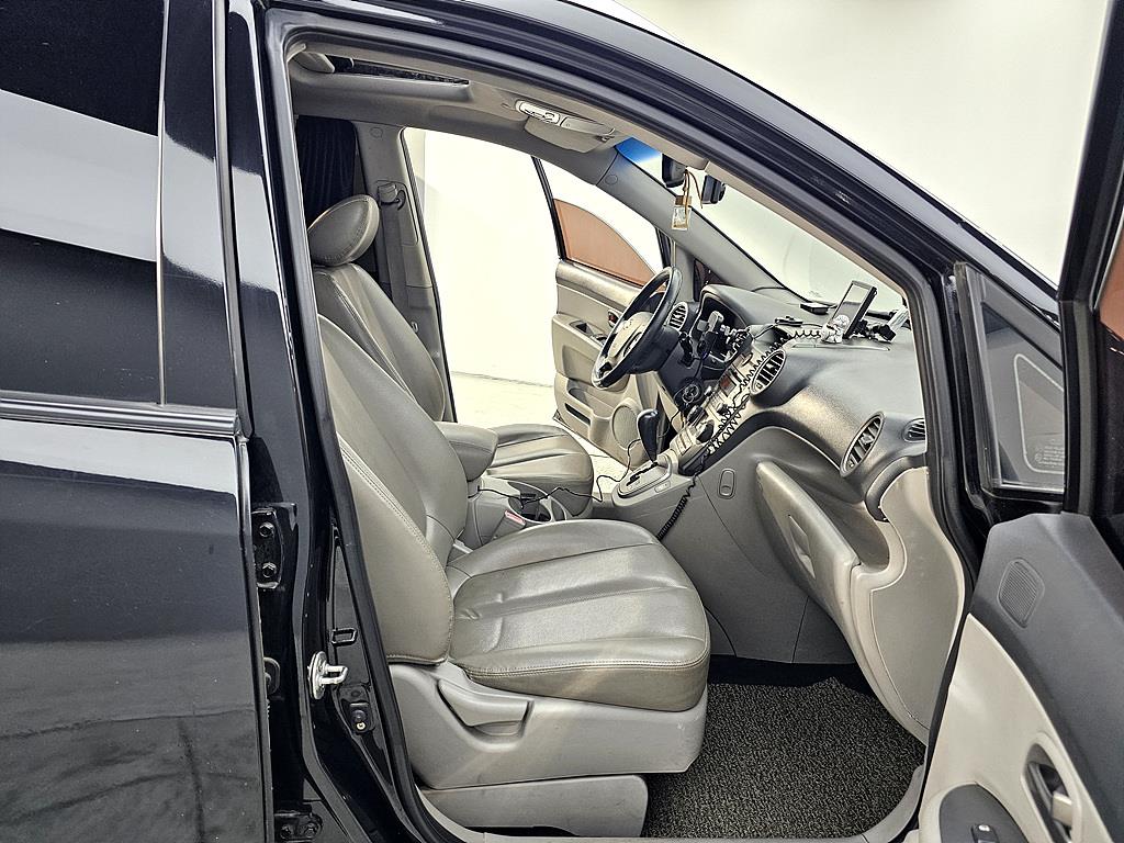 KIA Carens - Vista 7