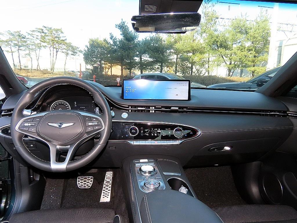 Genesis GV70 - Vista 7