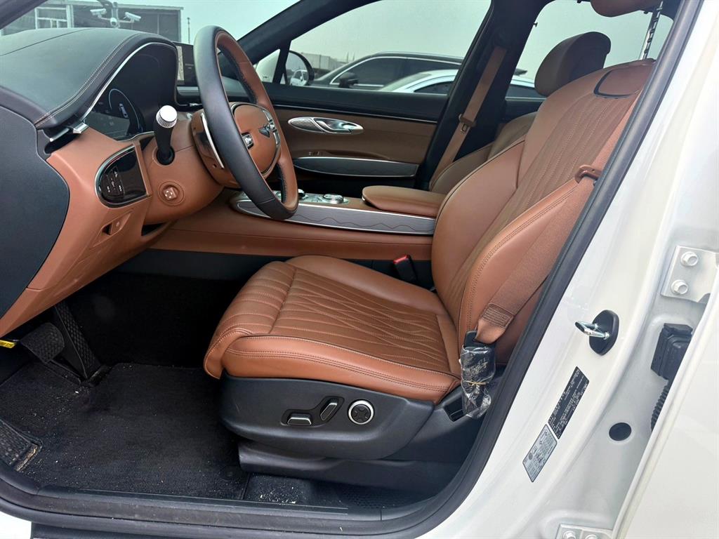 Genesis GV70 - Vista 7