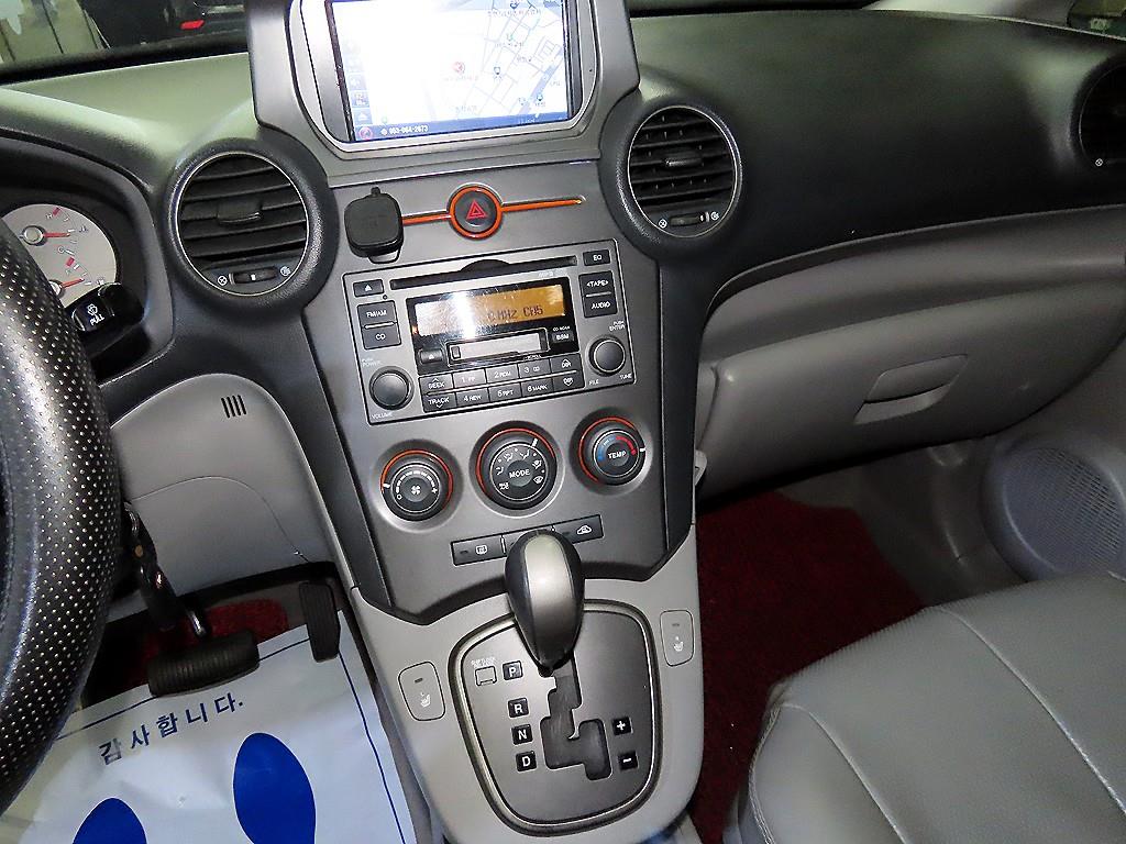 KIA Carens - Vista 11