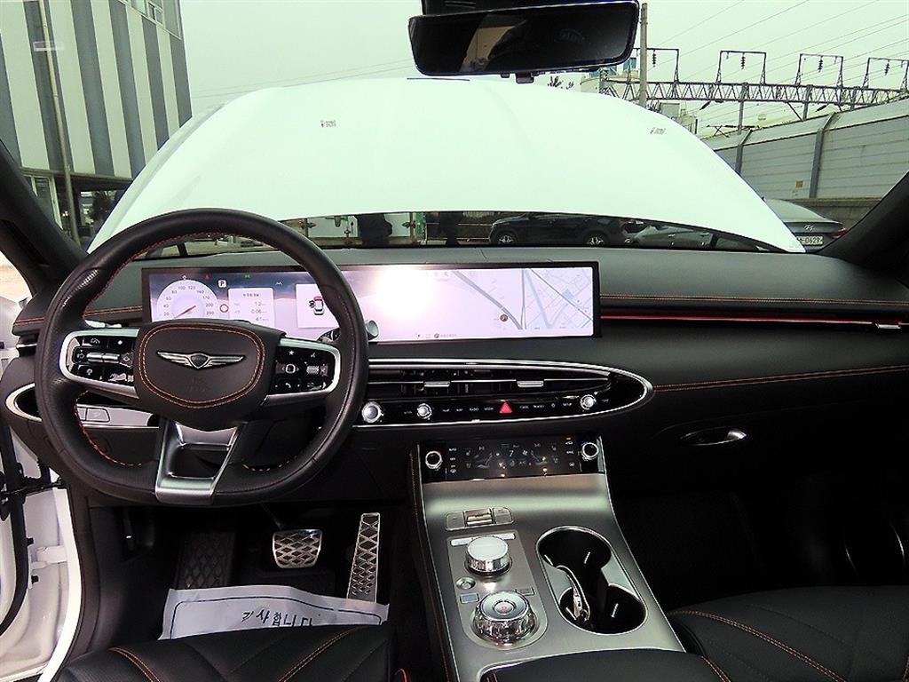 Genesis GV70 - Vista 7