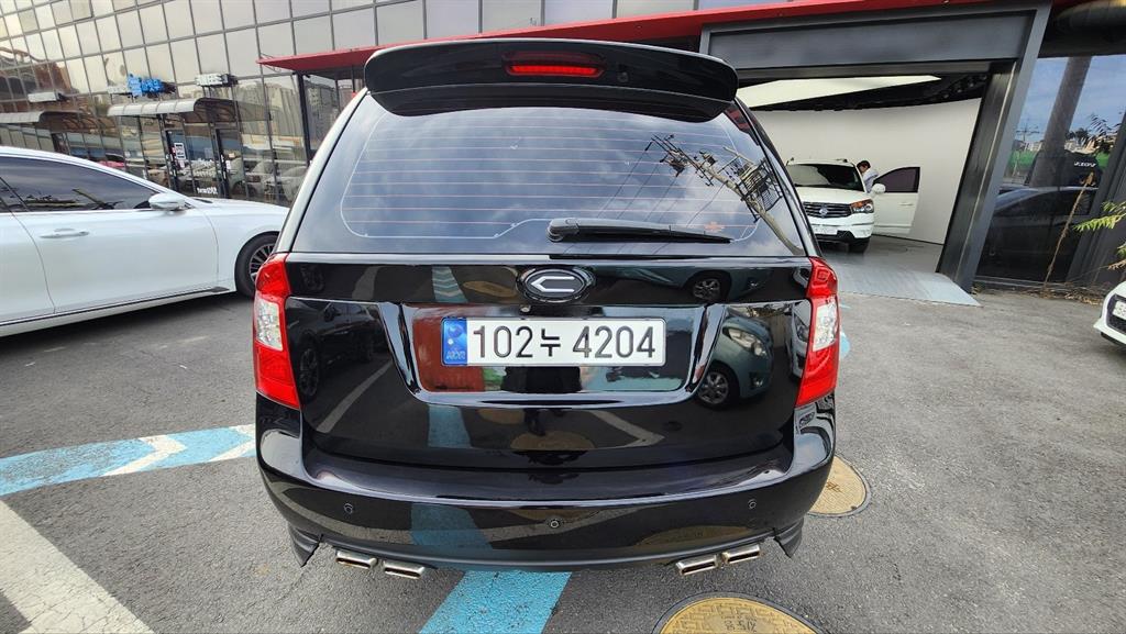 KIA Carens - Vista 4