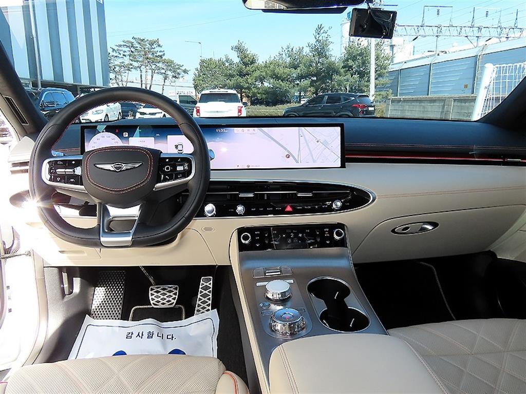 Genesis GV70 - Vista 7