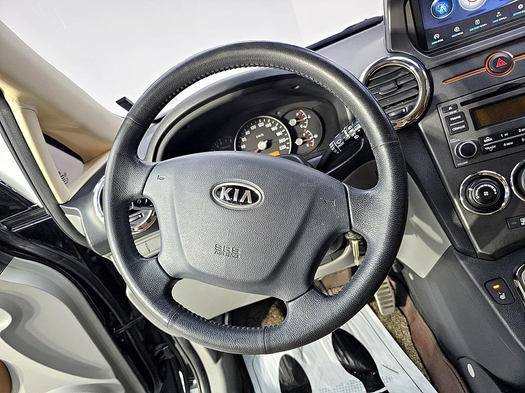 KIA Carens - Vista 12