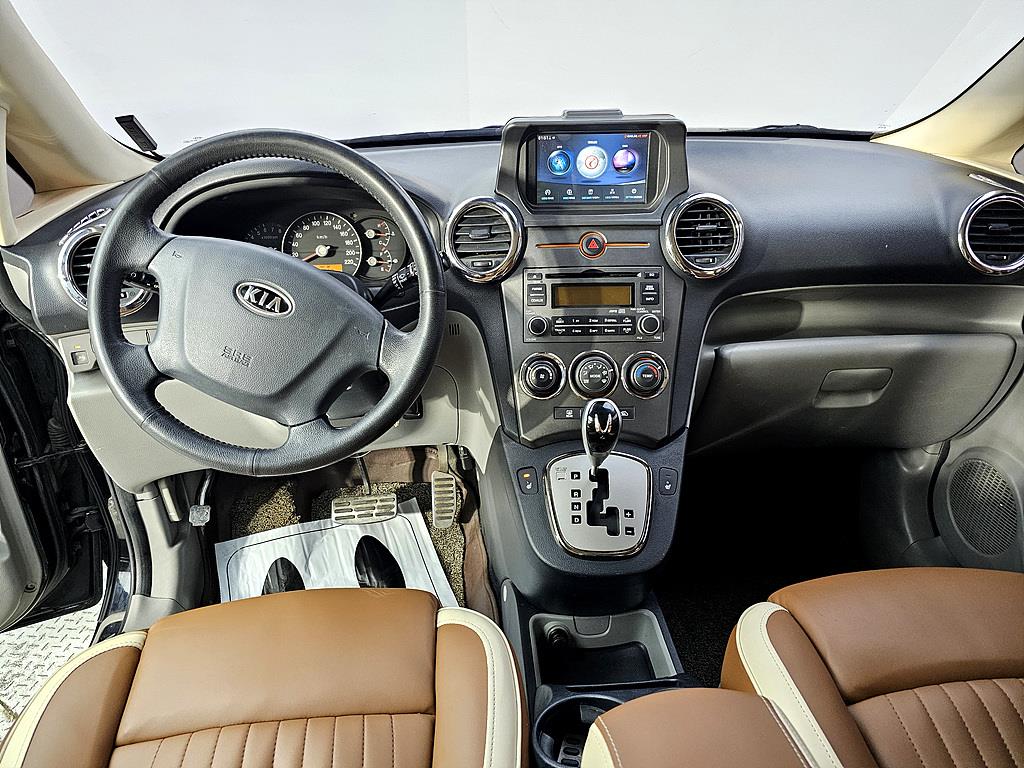 KIA Carens - Vista 5