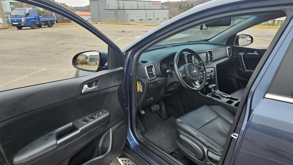 KIA Sportage - Vista 11