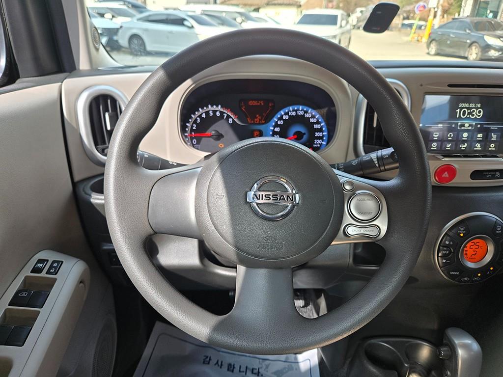 Nissan Cube - Vista 7