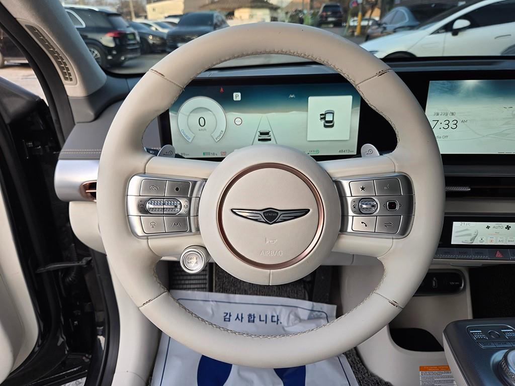 Genesis GV60 - Vista 7