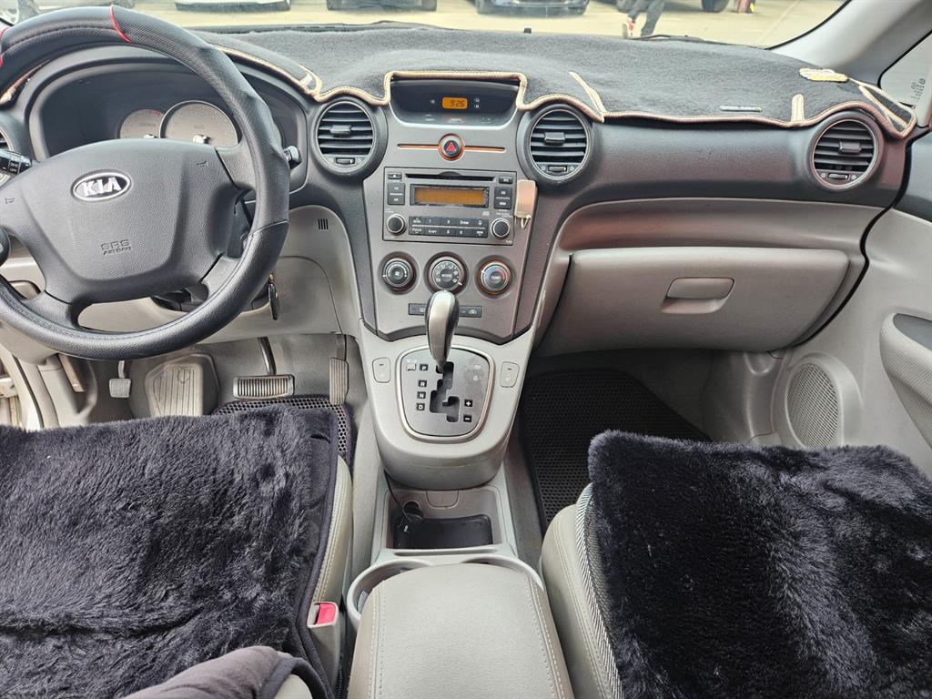 KIA Carens - Vista 7