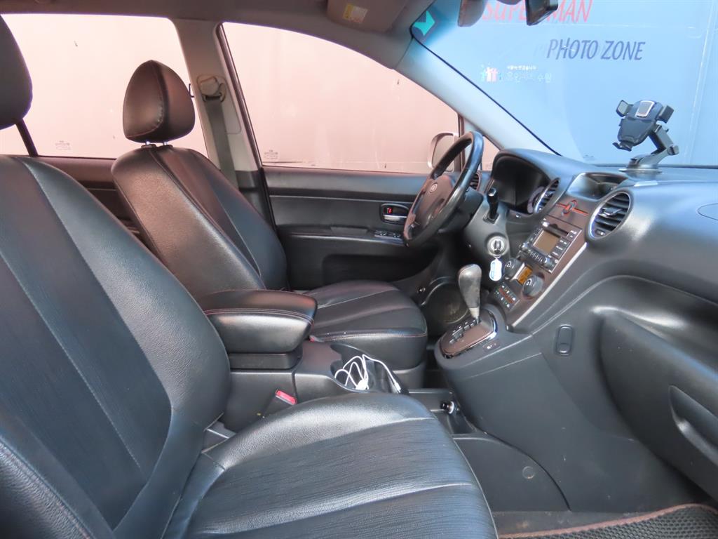 KIA Carens - Vista 11