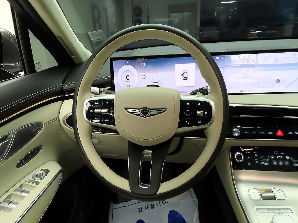 Genesis GV70 - Vista 7