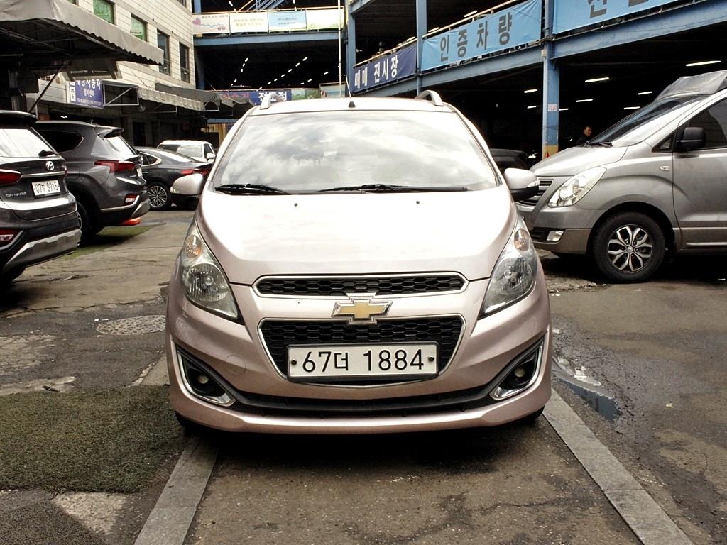 Chevrolet Spark 2013 Naranjo - Importación desde Corea - HF Imports Iquique - Foto 1