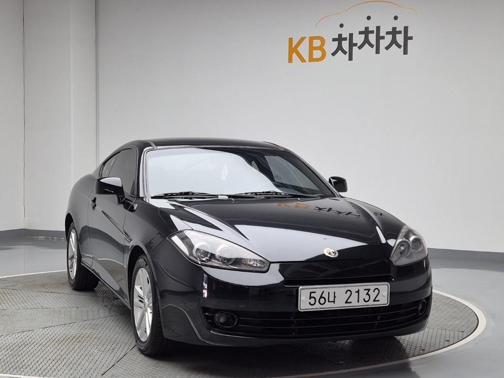 HYUNDAI Tuscani - Vista 4