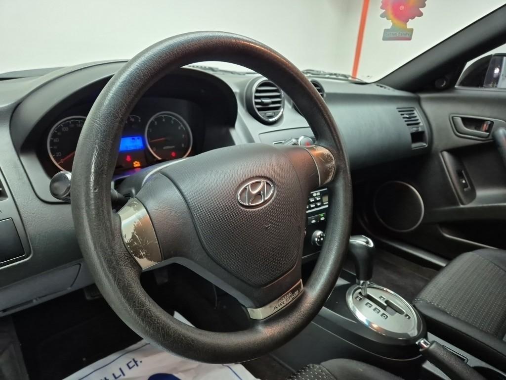 HYUNDAI Tuscani - Vista 9