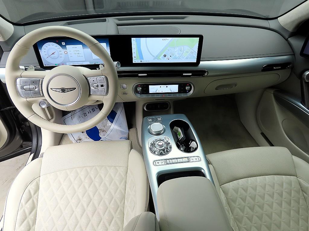 Genesis GV60 - Vista 7
