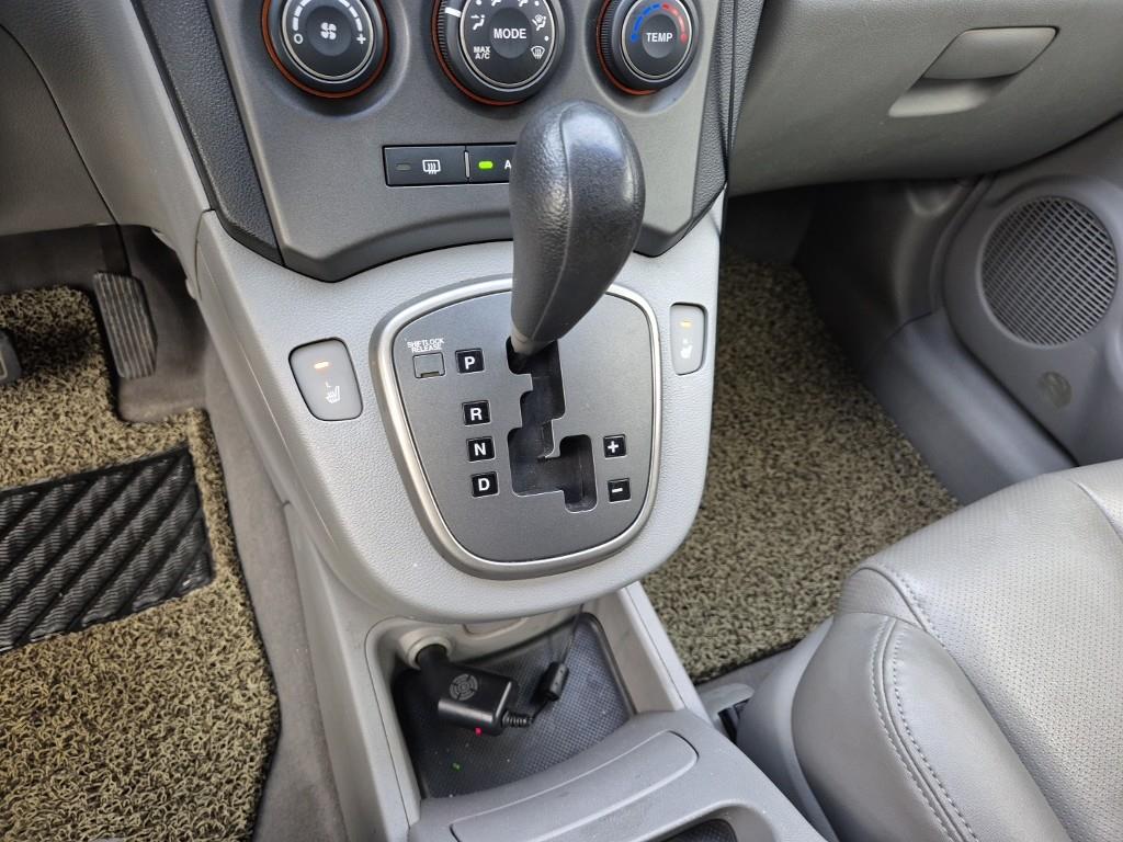 KIA Carens - Vista 8