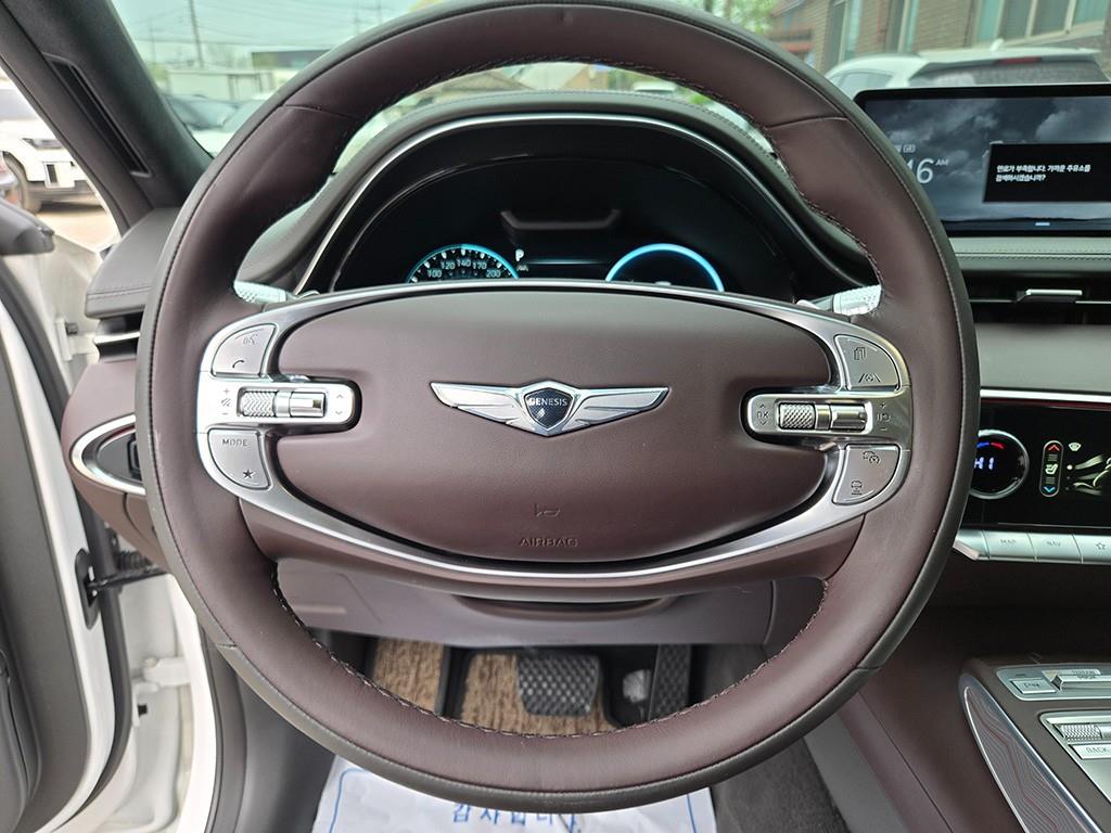 Genesis GV70 - Vista 7