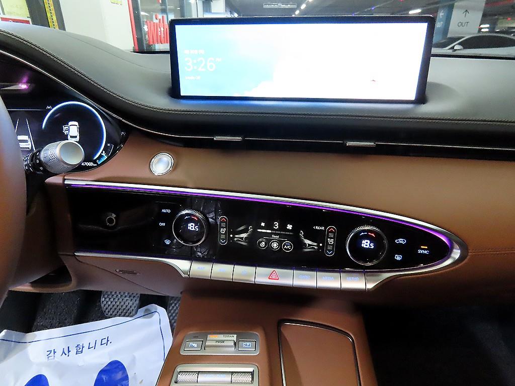 Genesis GV70 - Vista 11