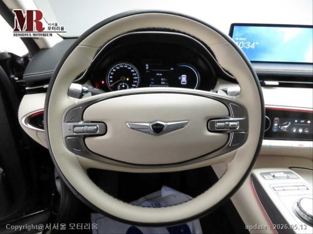 Genesis GV70 - Vista 8