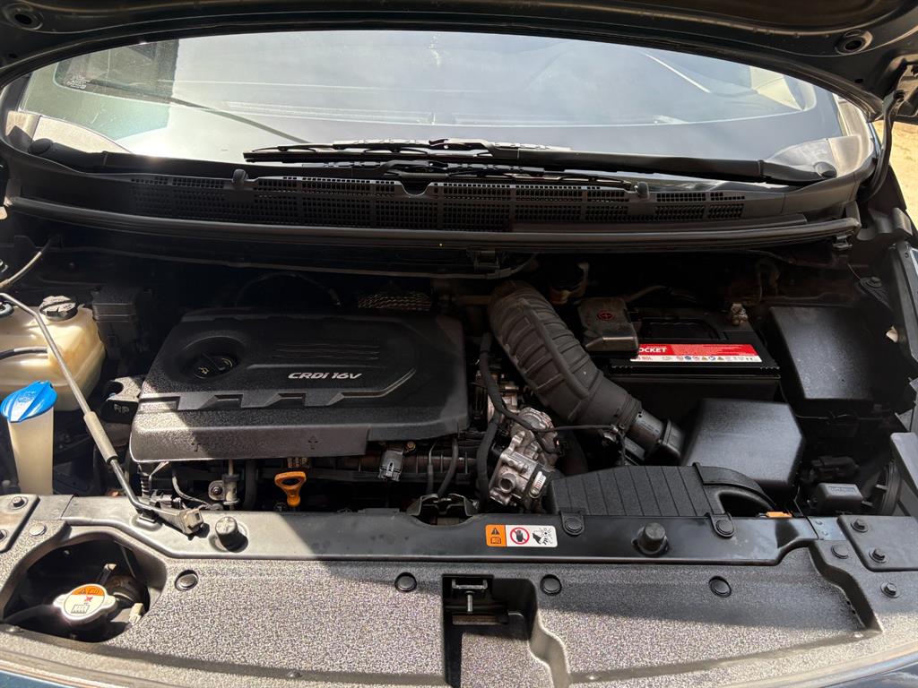 KIA Carens - Vista 7