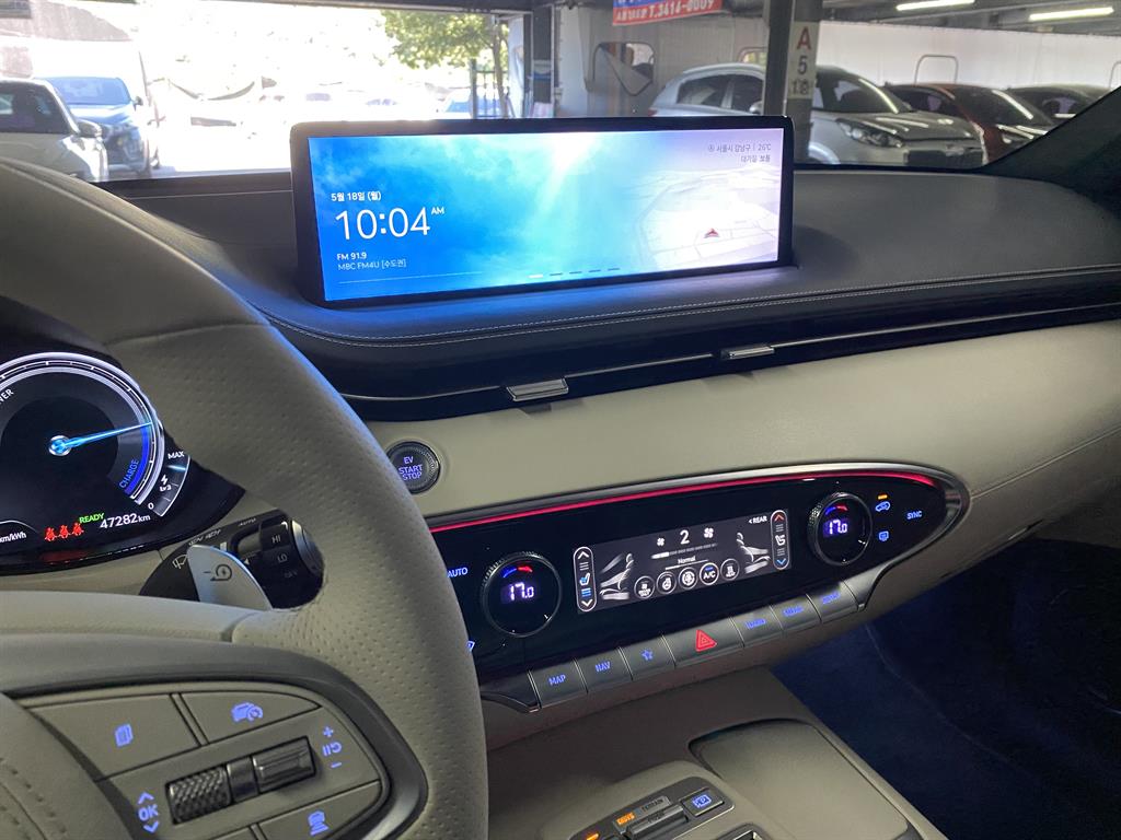 Genesis GV70 - Vista 8